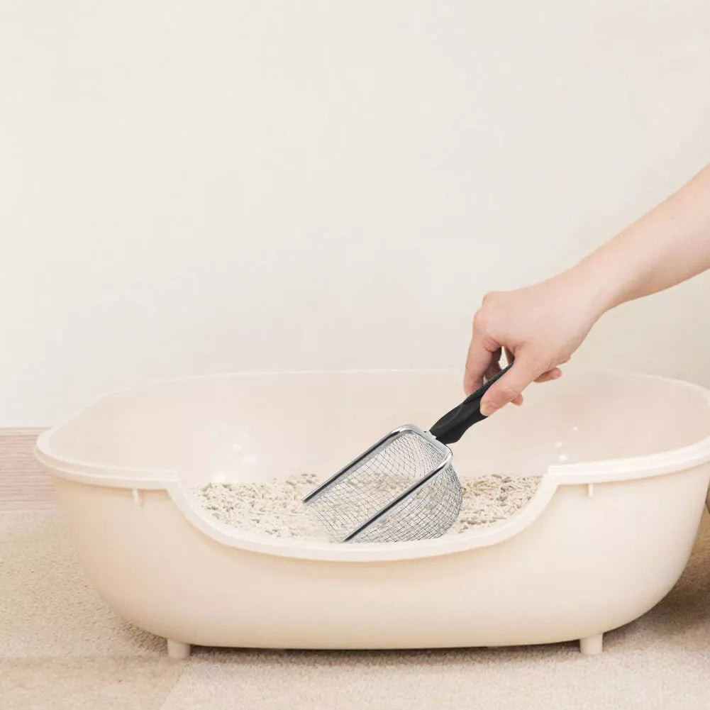 Pelle à litière ramassant litière