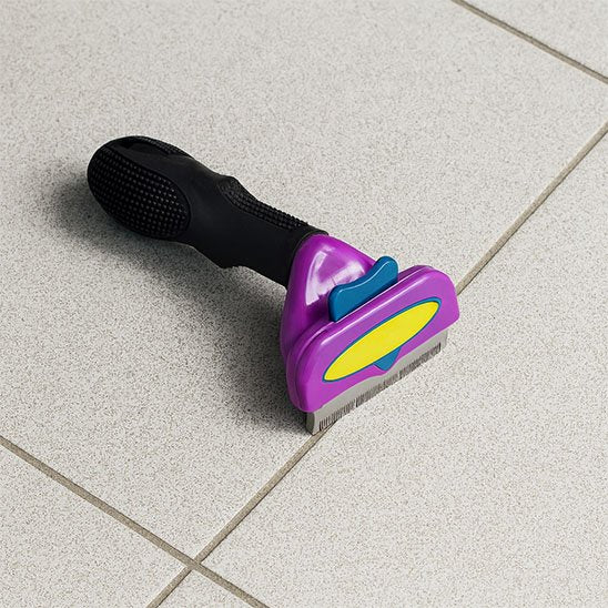 brosse pour chat violet 