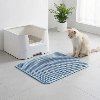 tapis litière chat bleu fenêtre chat blanc
